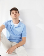 Blue pique cotton polo shirt with white outlines