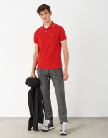 Red pique cotton polo shirt with white outlines