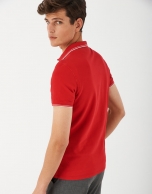 Red pique cotton polo shirt with white outlines