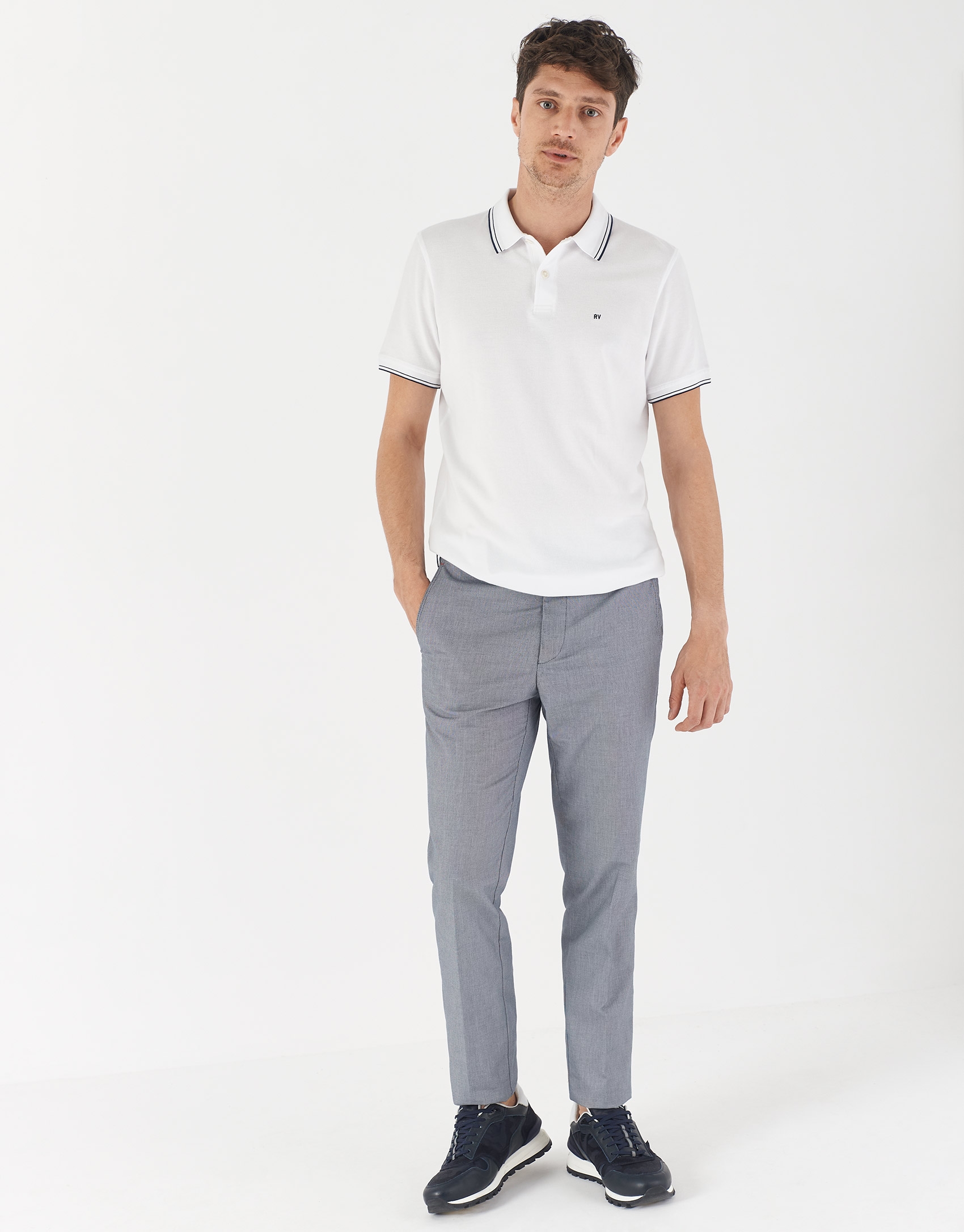 White pique cotton polo shirt with navy blue outlines