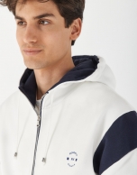 Navy blue and white plush zippered sweatshirt