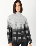 Gray and black checked knit sweater with high collar