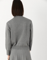 Gray sweater with raised collar and pockets