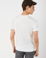 White cotton top with rounded gray logo