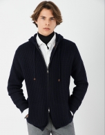 Navy blue jacket with hood and ribbing