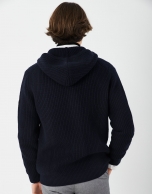 Navy blue jacket with hood and ribbing