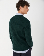 Green cable-stitched sweater