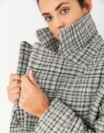 Short oversize coat with black and white checked pattern