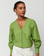 Green blouse with V-neck and bow