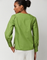 Green blouse with V-neck and bow