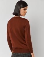 Orange fine-knit V-neck sweater