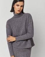 Gray knit cable-stitched sweater and turtleneck