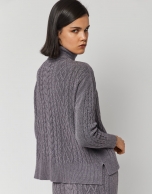 Gray knit cable-stitched sweater and turtleneck