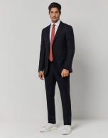 Navy blue pinstriped slim fit half canvas suit