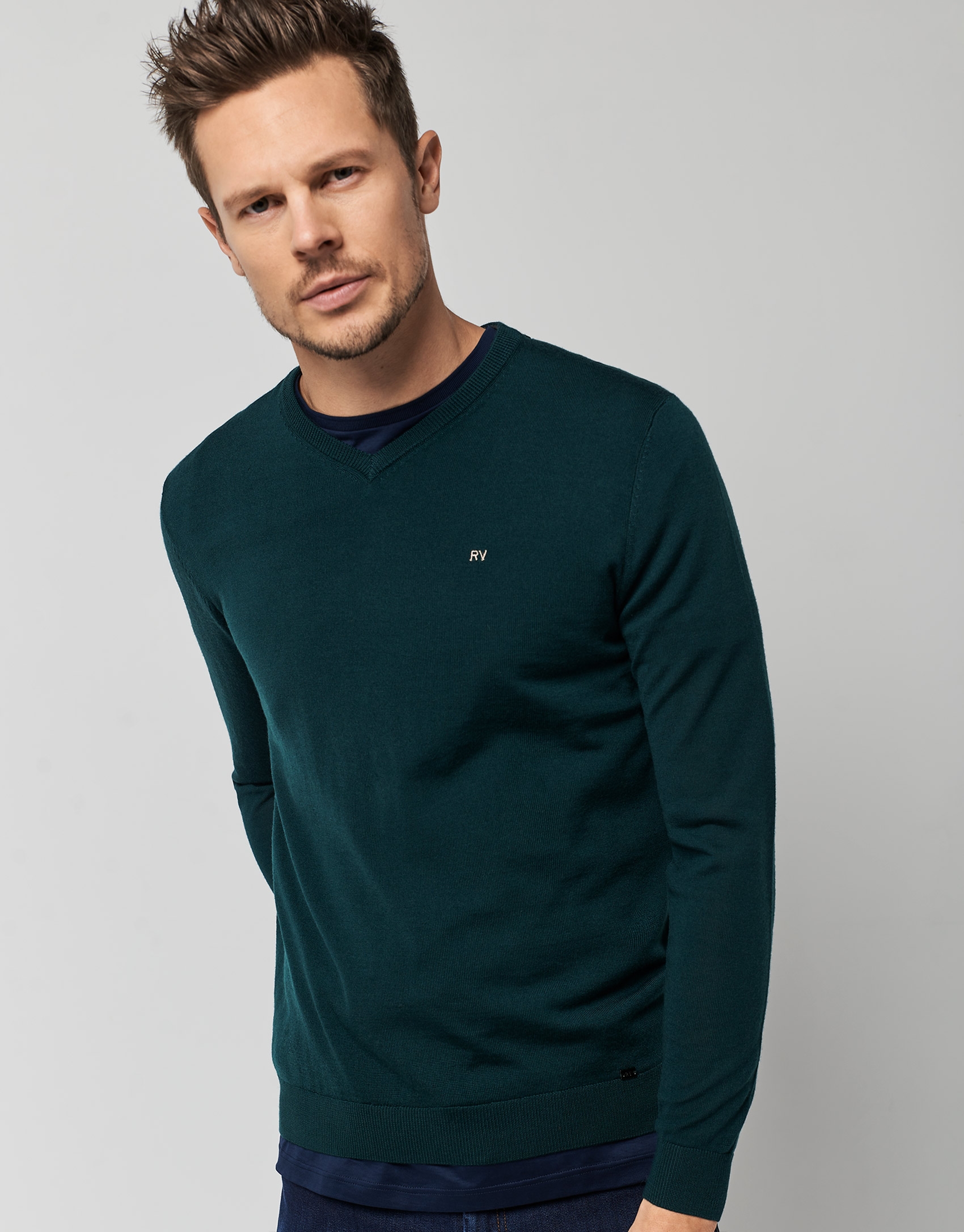 Green wool sweater with V-neck 