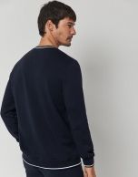 Navy blue felt sweatshirt with embossed RV logo on the chest