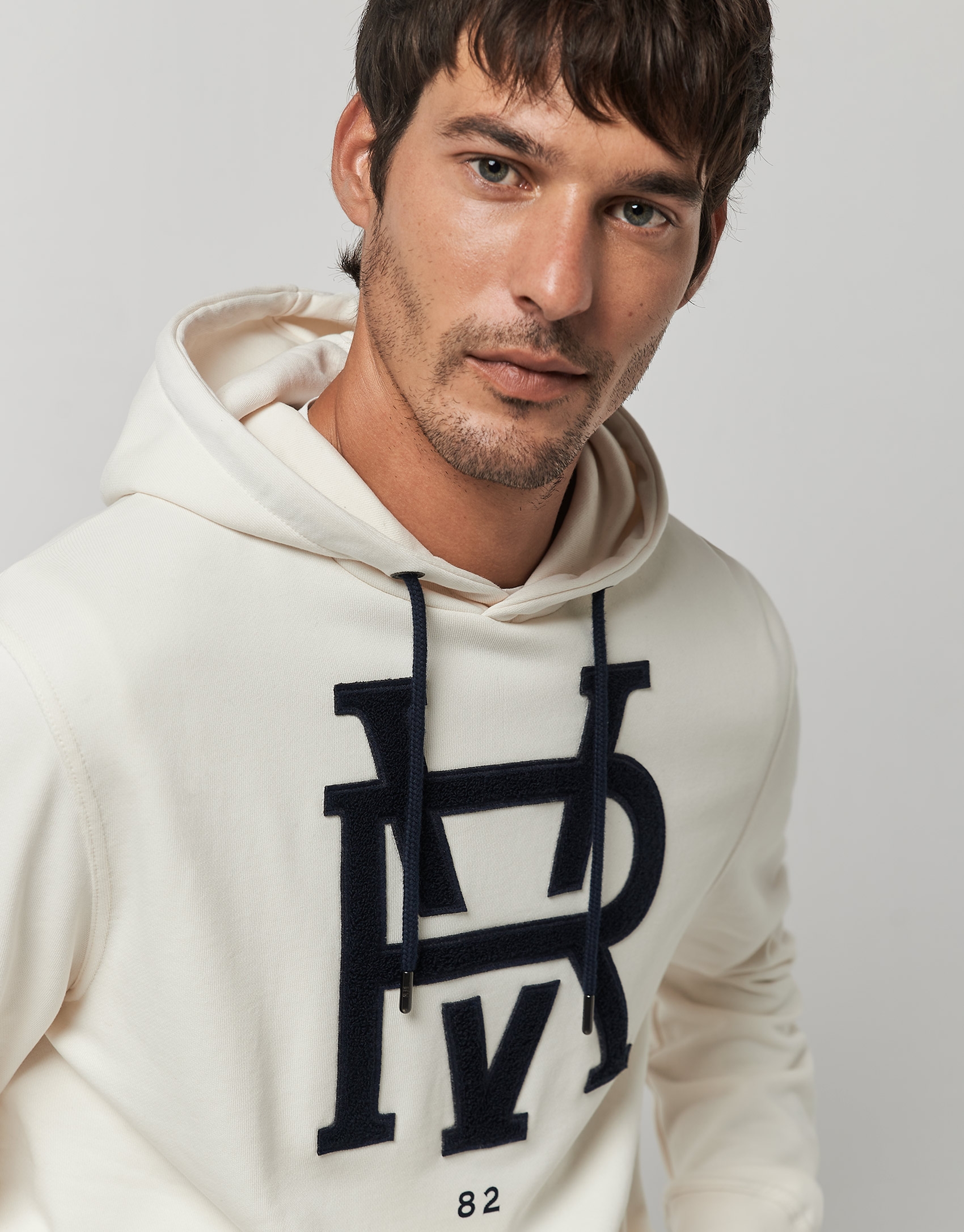 Sudadera felpa crudo con logo marino rizo