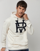 Beige felt sweatshirt with navy blue fuzzy RV logo 