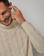 Beige structured wool sweater with a high collar