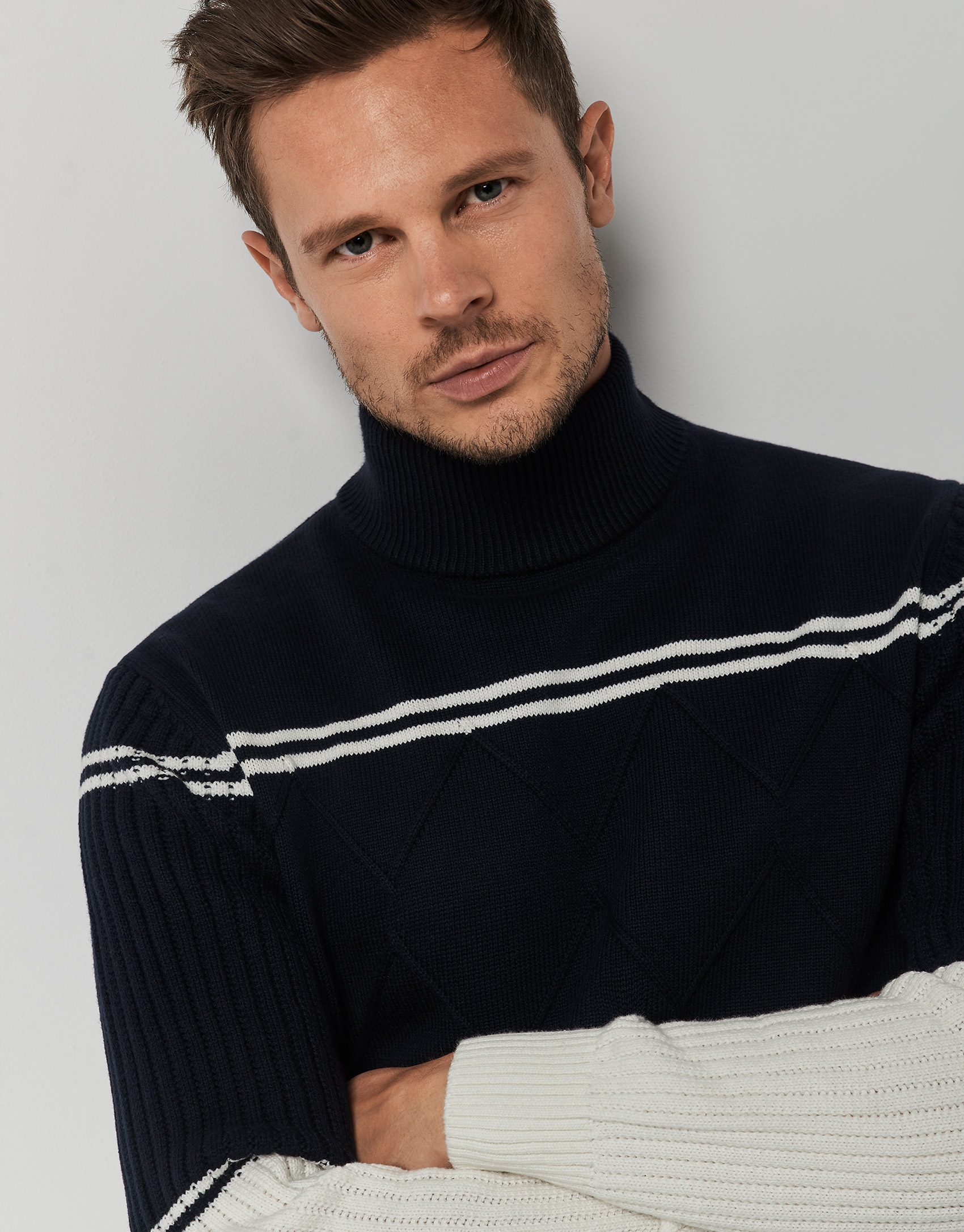 Navy blue and beige wool sweater with raised collar