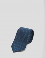 Blue silk tie with green geometric print jacquard