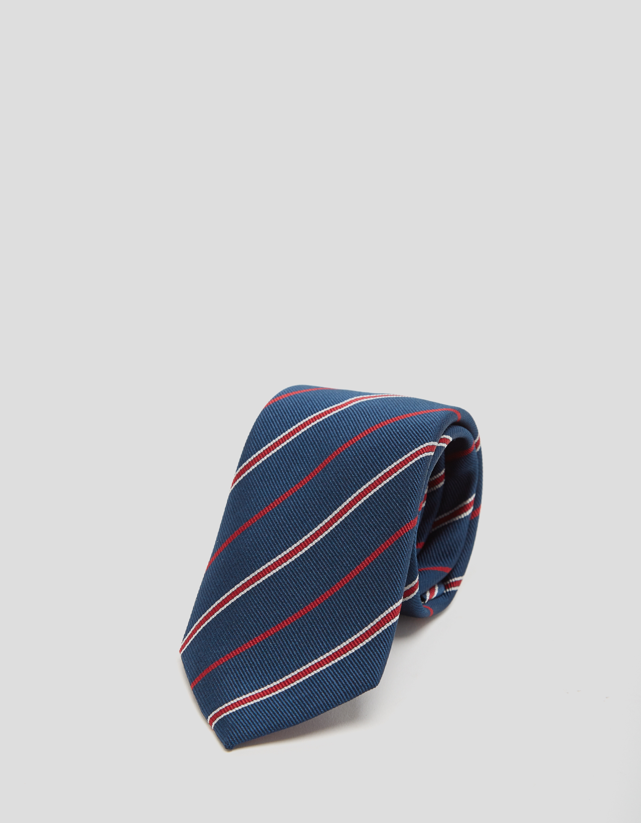 Navy blue silk tie with red and white stripes