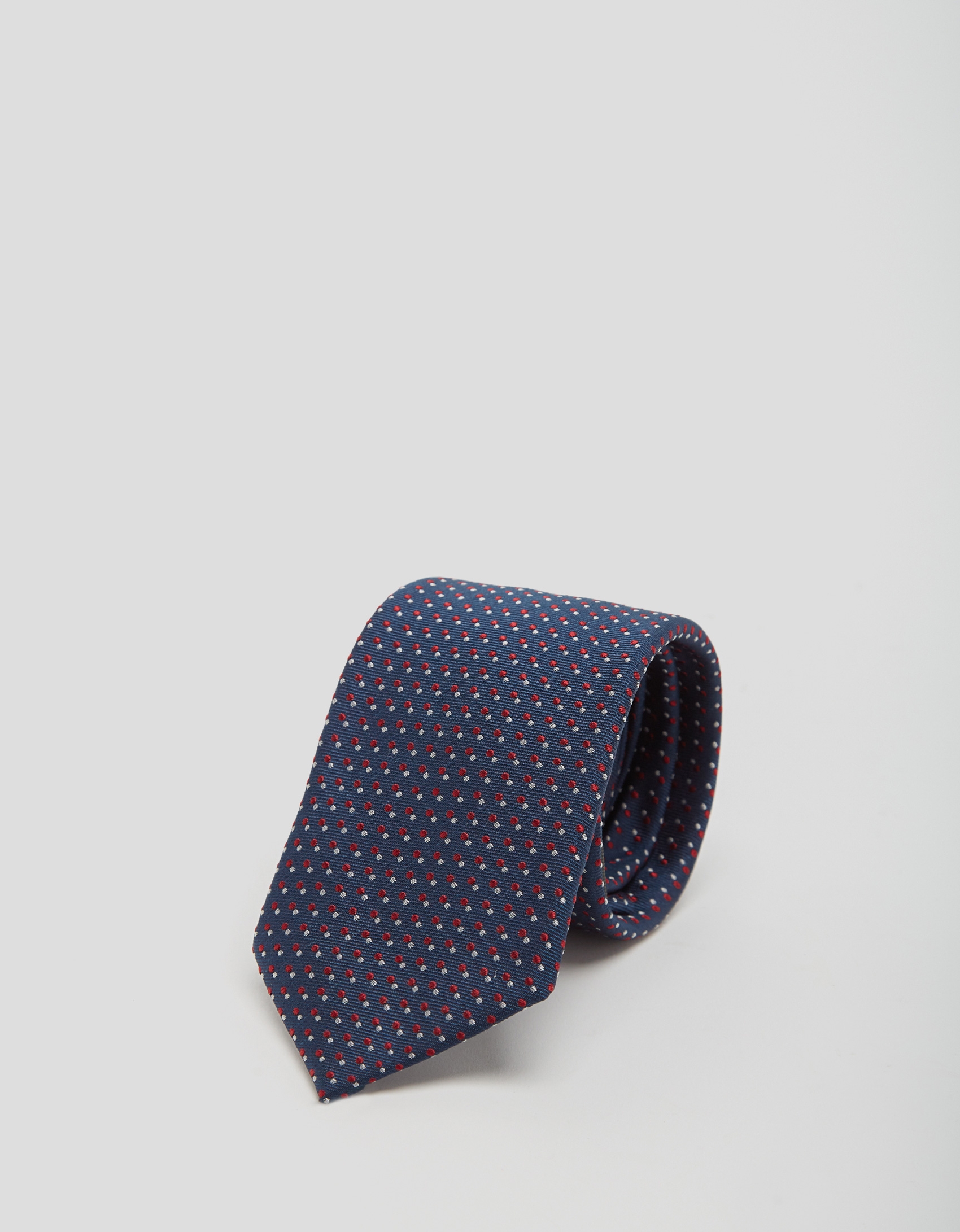 Blue silk tie with gray and red geometric print jacquard