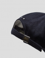 Navy blue felt baseball cap with embroidered design