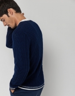 Blue cable-knit wool sweater with stripes on the cuffs