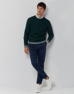 Green cable-knit wool sweater with stripes on the cuffs