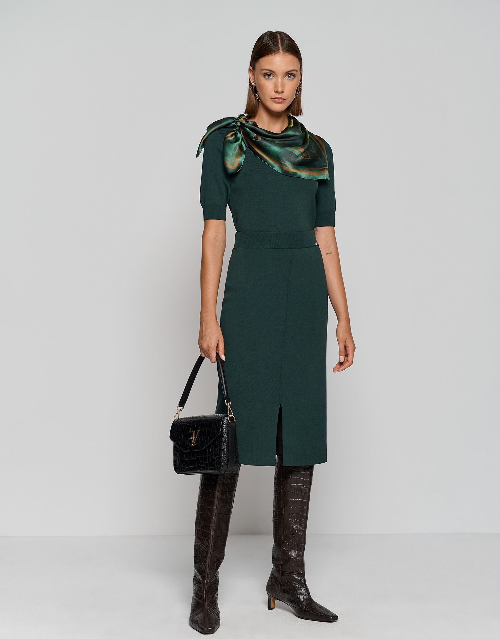 Dark green knit midi-skirt