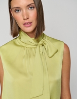 Green satin knit top with bow