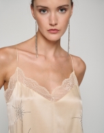 Beige satin halter top with lace and stars