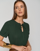 Dark green chiffon blouse with bow at the neck