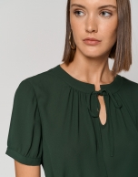 Dark green chiffon blouse with bow at the neck