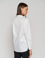 White blouse with glitter on flap