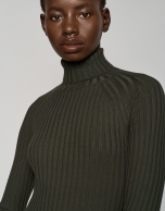 Green ribbed sweater with raised collar