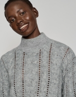 Gray cable knit sweater with openwork