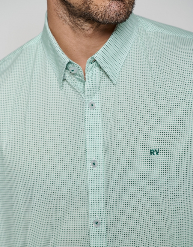 White regular sport shirt with green print