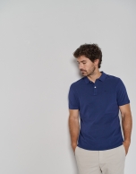 Dyed blue short sleeved polo shirt