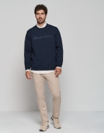 Navy blue sweatshirt with RV logo