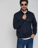 Navy blue sweatshirt with zippered neckline