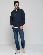 Navy blue sweatshirt with zippered neckline