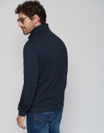 Navy blue sweatshirt with zippered neckline