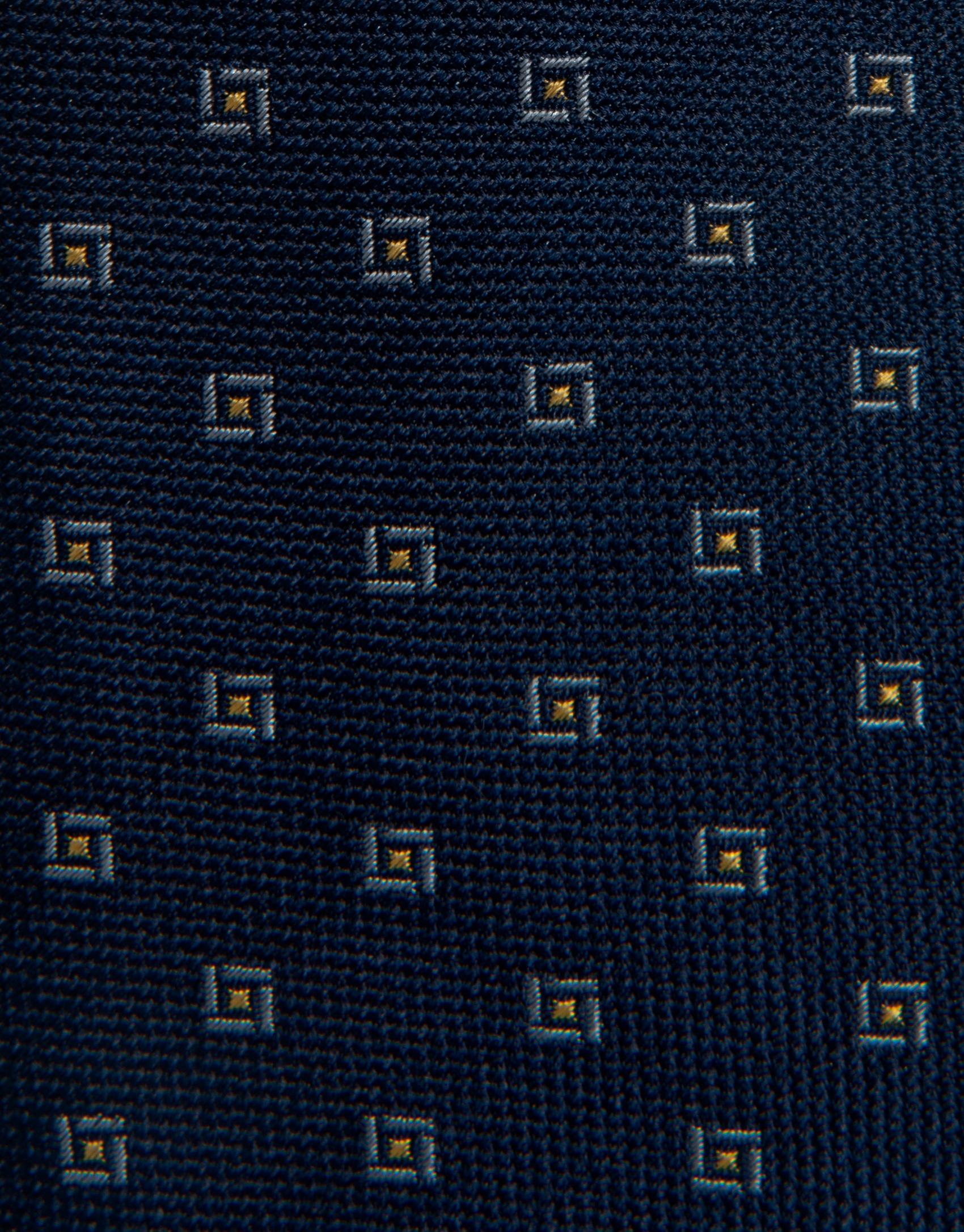 Navy blue silk tie with yellow and white geometric print jacquard