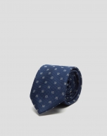 Navy blue silk tie with yellow and white geometric print jacquard