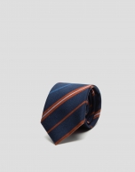 Navy blue silk tie with orange and blue stripes