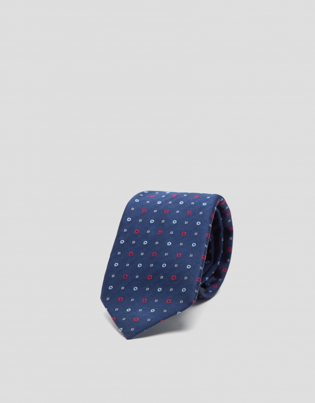 Navy blue silk tie with red and white geometric jacquard