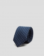 Navy blue silk tie with green and white geometric jacquard