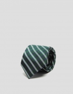 Green silk tie with navy blue and white stripes